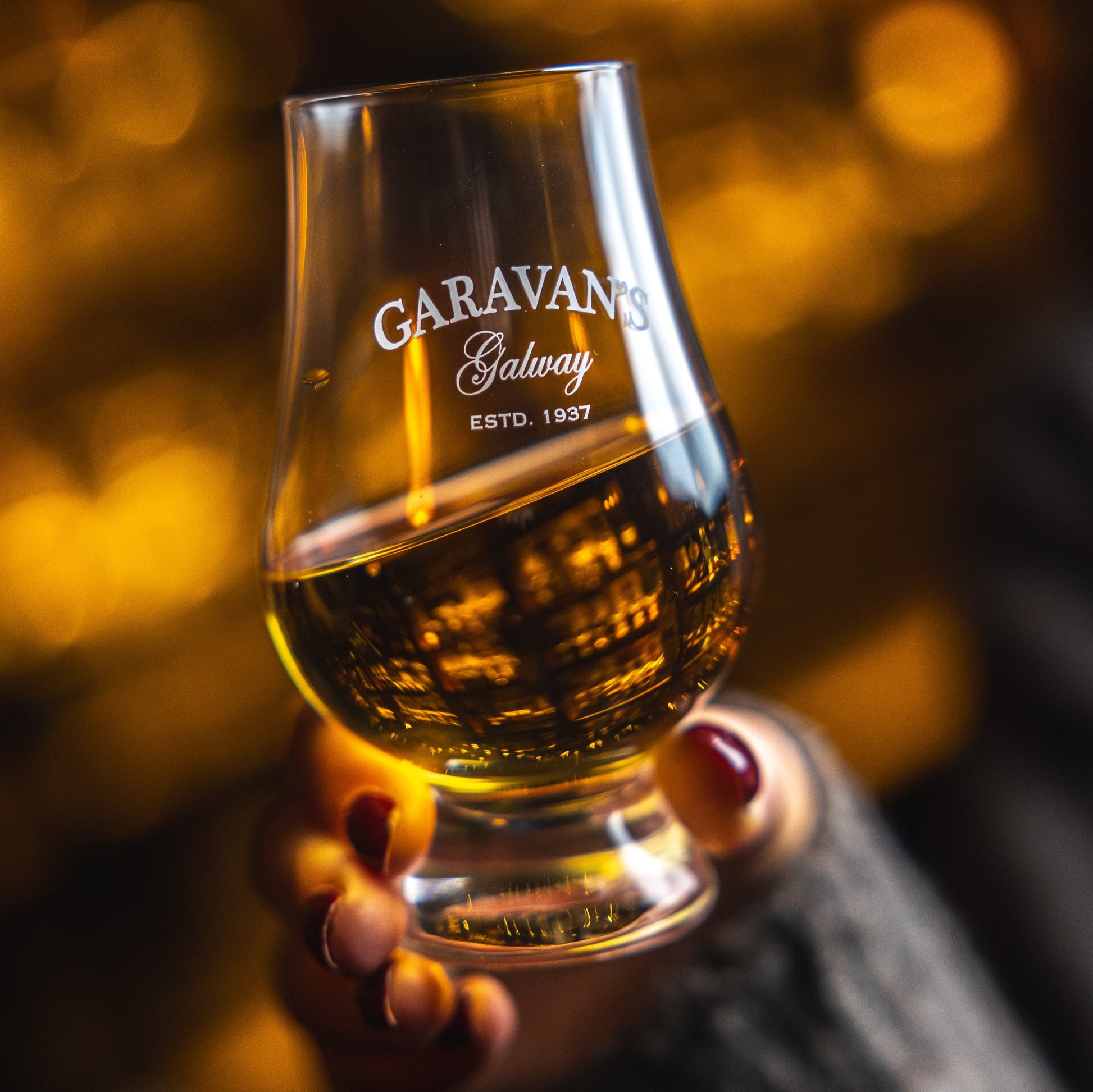 Killoury’s Irish Whiskey, a blend of malt, grain, and pot still whiskey, smooth with vanilla, cereal, nut, coffee, and fruit cake notes, exclusive to Garavan’s Bar.
