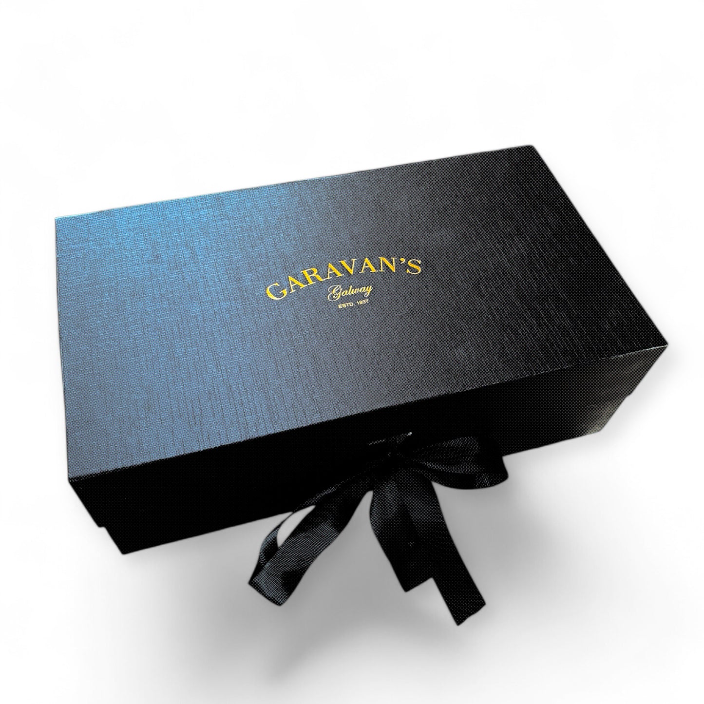 Killoury’s Irish Whiskey Gift Set, a triple blend of malt, grain, and pot still whiskey with vanilla, cereal, nut, coffee, and fruit cake notes, presented in a keepsake box with two Garavan’s whiskey glasses.